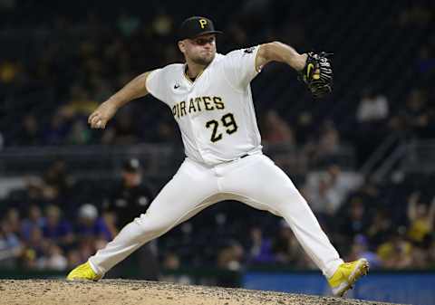 Aug 3, 2022; Pittsburgh, Pennsylvania, USA; Pittsburgh Pirates relief pitcher Wil Crowe (29) pitches against the Milwaukee Brewers during the ninth inning at PNC Park. The Pirates won 8-7. Mandatory Credit: Charles LeClaire-USA TODAY Sports