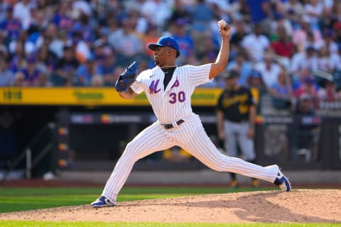 Sep 18, 2022; New York City, New York, USA; New York Mets pitcher Joely Rodriguez (30) delivers a pitch against the Pittsburgh Pirates during the eighth inning at Citi Field. Mandatory Credit: Gregory Fisher-USA TODAY Sports