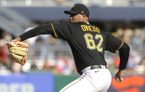 Oct 5, 2022; Pittsburgh, Pennsylvania, USA; Pittsburgh Pirates starting pitcher Johan Oviedo (62) delivers a pitch against the St. Louis Cardinals during the first inning at PNC Park. Mandatory Credit: Charles LeClaire-USA TODAY Sports