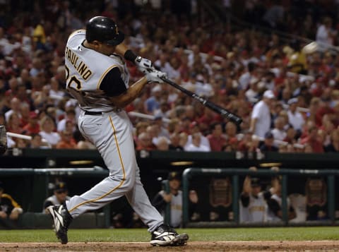 Sep 2, 2006; St. Louis, MO, USA; Pittsburgh Pirates catcher (26) Ronny Paulino hits a sacrifice fly against the St. Louis Cardinals at Busch Stadium. The Pirates defeated the Cardinals 1-0. Mandatory Credit: Photo by Scott Rovak-USA TODAY Sports (©) Copyright 2006 by Scott Rovak