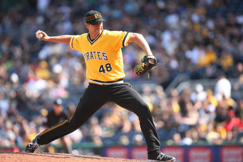 Jun 5, 2016; Pittsburgh, PA, USA; Pittsburgh Pirates relief pitcher Jared Hughes (48) pitches against the Los Angeles Angels during the ninth inning at PNC Park. The Angels won 5-4. Mandatory Credit: Charles LeClaire-USA TODAY Sports