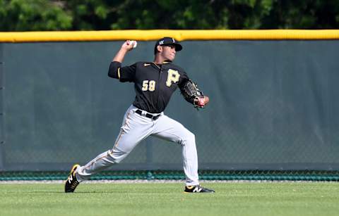 Feb 24, 2021; Bradenton, Florida, USA; Pittsburgh Pirates pitcher Roansy Contreras (59) warms up during spring training at Pirate City. Mandatory Credit: Jonathan Dyer-USA TODAY Sports