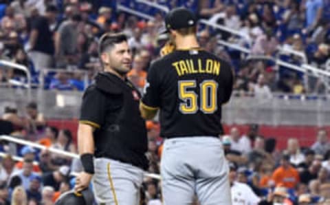 Apr 28, 2017; Miami, FL, USA; Pittsburgh Pirates catcher Francisco Cervelli (left) talks with Pirates starting pitcher Jameson Taillon (right) near the pitching mound during the fifth inning against the Miami Marlins at Marlins Park. Mandatory Credit: Steve Mitchell-USA TODAY Sports