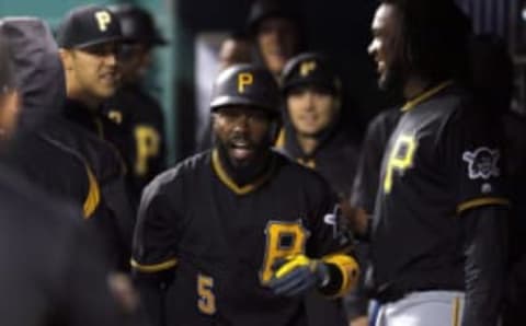 May 1, 2017; Cincinnati, OH, USA; Pittsburgh Pirates second baseman Josh Harrison (5) celebrates in the dugout after hitting a solo home run against the Cincinnati Reds during the sixth inning at Great American Ball Park. Mandatory Credit: David Kohl-USA TODAY Sports