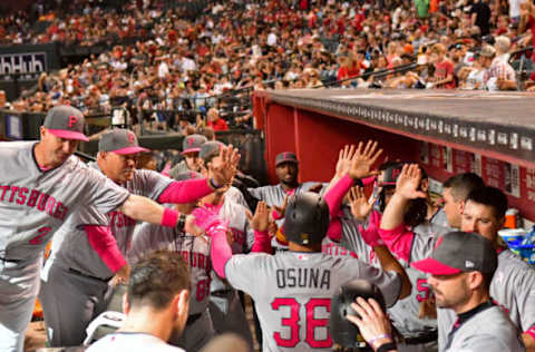 May 14, 2017; Phoenix, AZ, USA; Pittsburgh Pirates right fielder Jose Osuna (36) celebrates with teammates after hitting a two run home run in the tenth inning against the Arizona Diamondbacks at Chase Field. Mandatory Credit: Matt Kartozian-USA TODAY Sports