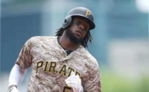 May 18, 2017; Pittsburgh, PA, USA; Pittsburgh Pirates first baseman Josh Bell (55) circles the bases on a two run home run against the Washington Nationals during the first inning at PNC Park. Mandatory Credit: Charles LeClaire-USA TODAY Sports