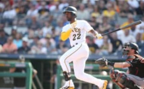 Jun 10, 2017; Pittsburgh, PA, USA; Pittsburgh Pirates center fielder Andrew McCutchen (22) hits an RBI double for his 500th career extra base hit against the Miami Marlins during the third inning at PNC Park. Mandatory Credit: Charles LeClaire-USA TODAY Sports