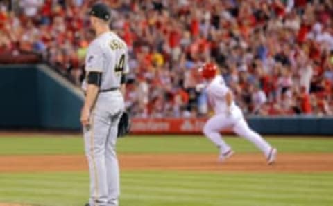 Jun 25, 2017; St. Louis, MO, USA; Pittsburgh Pirates relief pitcher Tony Watson (44) watches as St. Louis Cardinals’ Jedd Gyorko runs to second after hitting a RBI ground rule double during the sixth inning at Busch Stadium. Mandatory Credit: Scott Kane-USA TODAY Sports