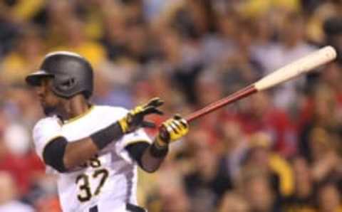 Sep 23, 2016; Pittsburgh, PA, USA; Pittsburgh Pirates second baseman Alen Hanson (37) singles against the Washington Nationals during the second inning at PNC Park. Mandatory Credit: Charles LeClaire-USA TODAY Sports