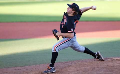 June 9, 2013; Corvallis, OR, USA; Oregon State Beavers pitcher Andrew Moore (23) pitches against the Kansas State Wildcats in the Corvallis Super Regional at Goss Stadium. Mandatory Credit: Jaime Valdez-USA TODAY Sports