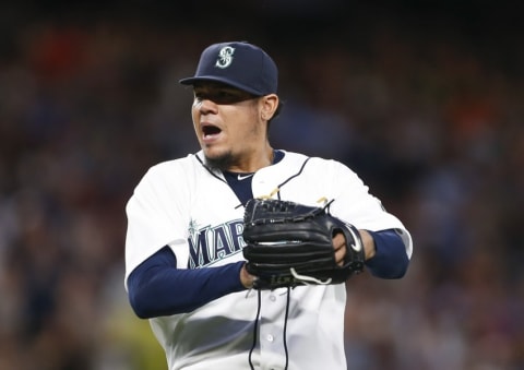 Jun 17, 2015; Seattle, WA, USA; Seattle Mariners pitcher Felix Hernandez (34) reacts after getting the final out of the eighth inning against the San Francisco Giants at Safeco Field. Mandatory Credit: Joe Nicholson-USA TODAY Sports