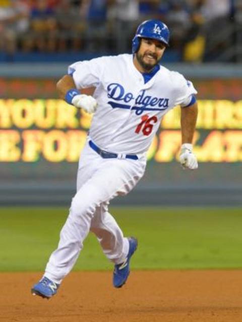 Aug 11, 2015; Los Angeles, CA, USA; Los Angeles Dodgers right fielder Andre Ethier (16) heads for third on a triple in the fourth inning of the game against the Washington Nationals at Dodger Stadium. Mandatory Credit: Jayne Kamin-Oncea-USA TODAY Sports