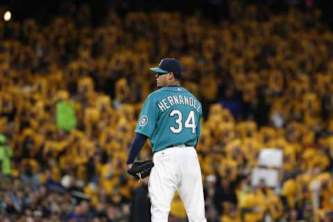 Apr 24, 2015; Seattle, WA, USA; Seattle Mariners pitcher Felix Hernandez (34) looks in toward the plate during the sixth inning against the Minnesota Twins at Safeco Field. Mandatory Credit: Jennifer Buchanan-USA TODAY Sports