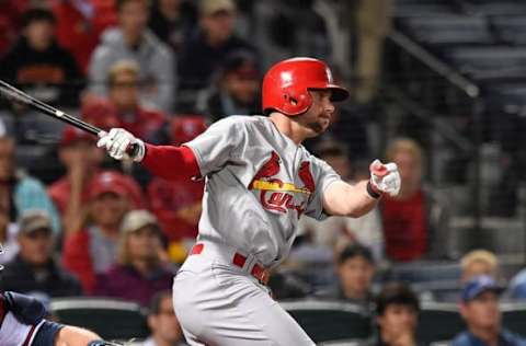 Oct 2, 2015; Atlanta, GA, USA; St. Louis Cardinals second baseman Greg Garcia (35) hits a double against the Atlanta Braves during the first inning at Turner Field. Mandatory Credit: Dale Zanine-USA TODAY Sports