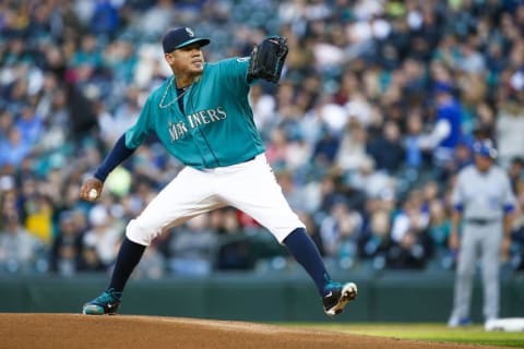 Apr 29, 2016; Seattle, WA, USA; Seattle Mariners starting pitcher Felix Hernandez (34) throws against the Kansas City Royals during the first inning at Safeco Field. Mandatory Credit: Joe Nicholson-USA TODAY Sports