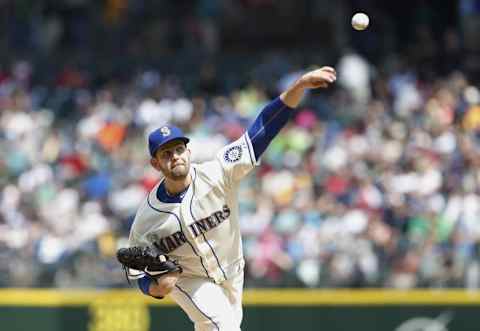 May 17, 2015; Seattle, WA, USA; Seattle Mariners pitcher James Paxton (65) throws a pitch in the sixth inning against the Boston Red Sox at Safeco Field. Mandatory Credit: Jennifer Buchanan-USA TODAY Sports