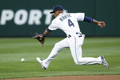 Apr 8, 2016; Seattle, WA, USA; Seattle Mariners shortstop Ketel Marte (4) pursues a ground ball during the first inning against the Oakland Athletics at Safeco Field. Mandatory Credit: Joe Nicholson-USA TODAY Sports