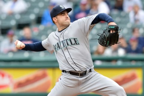 Apr 21, 2016; Cleveland, OH, USA; Seattle Mariners starting pitcher Nathan Karns (13) throws a pitch during the first inning against the Cleveland Indians at Progressive Field. Mandatory Credit: Ken Blaze-USA TODAY Sports