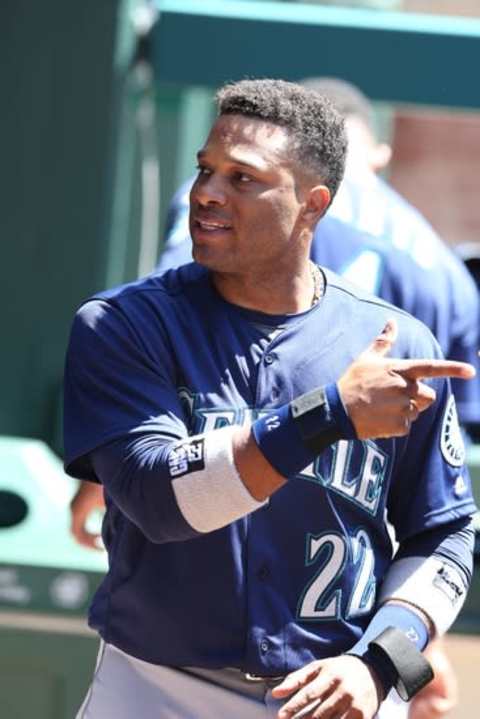 Apr 6, 2016; Arlington, TX, USA; Seattle Mariners second baseman Robinson Cano (22) in the dugout prior to the game against the Texas Rangers at Globe Life Park in Arlington. Mandatory Credit: Matthew Emmons-USA TODAY Sports