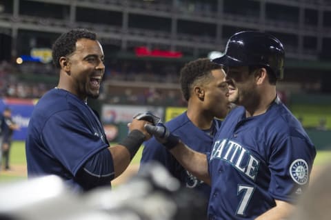 Apr 5, 2016; Arlington, TX, USA; Seattle Mariners designated hitter Nelson Cruz (23) and left fielder Seth Smith (7) celebrate after a two run home run by Smith against the Texas Rangers during the eighth inning at Globe Life Park in Arlington. The Mariners defeated the Rangers 10-2. Mandatory Credit: Jerome Miron-USA TODAY Sports