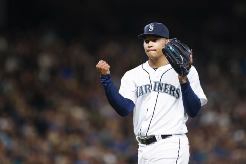 Apr 8, 2016; Seattle, WA, USA; Seattle Mariners starting pitcher Taijuan Walker (44) reacts after getting the final out of the sixth inning against the Oakland Athletics at Safeco Field. Mandatory Credit: Joe Nicholson-USA TODAY Sports