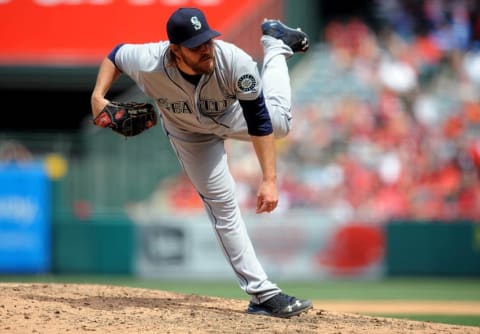 April 24, 2016; Anaheim, CA, USA; Seattle Mariners starting pitcher Wade Miley (20) throws in the fifth inning against Los Angeles Angels at Angel Stadium of Anaheim. Mandatory Credit: Gary A. Vasquez-USA TODAY Sports