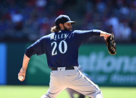 Apr 6, 2016; Arlington, TX, USA; Seattle Mariners starting pitcher Wade Miley (20) throws a pitch in the first inning against the Texas Rangers at Globe Life Park in Arlington. Mandatory Credit: Matthew Emmons-USA TODAY Sports