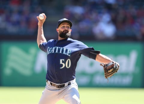 Apr 6, 2016; Arlington, TX, USA; Seattle Mariners relief pitcher Nick Vincent (50) pitches in the seventh inning against the Texas Rangers at Globe Life Park in Arlington. Mandatory Credit: Matthew Emmons-USA TODAY Sports