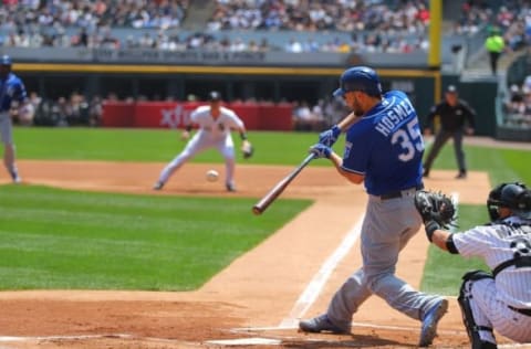 May 21, 2016; Chicago, IL, USA; Kansas City Royals first baseman Eric Hosmer (35) hits an RBI sacrifice fly during the first inning against the Chicago White Sox at U.S. Cellular Field. Mandatory Credit: Dennis Wierzbicki-USA TODAY Sports