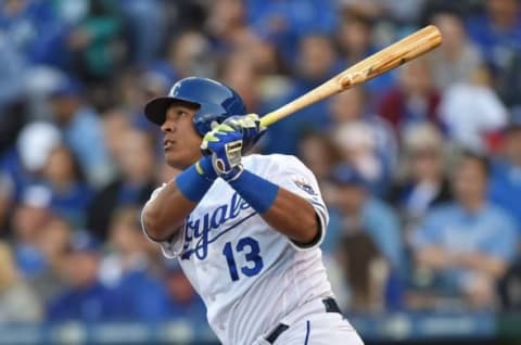 May 14, 2016; Kansas City, MO, USA; Kansas City Royals catcher Salvador Perez (13) doubles against the Atlanta Braves during the second inning at Kauffman Stadium. Mandatory Credit: Peter G. Aiken-USA TODAY Sports