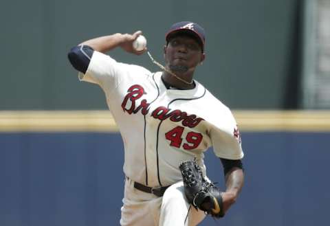 Jul 17, 2016; Atlanta, GA, USA; Atlanta Braves starting pitcher Julio Teheran (49) delivers a pitch to a Colorado Rockies batter in the first inning of their game at Turner Field. Mandatory Credit: Jason Getz-USA TODAY Sports