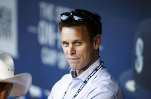 Sep 30, 2015; Seattle, WA, USA; Seattle Mariners general manager Jerry Dipoto conducts an interview in the dugout before a game against the Houston Astros at Safeco Field. Mandatory Credit: Joe Nicholson-USA TODAY Sports