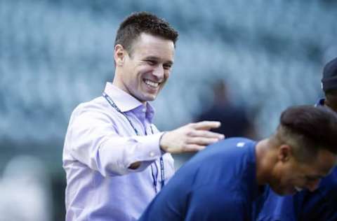 Aug 22, 2016; Seattle, WA, USA; Seattle Mariners general manger Jerry Dipoto laughs with one of his players during batting practice before a game against the New York Yankees at Safeco Field. Seattle defeated New York, 7-5. Mandatory Credit: Joe Nicholson-USA TODAY Sports