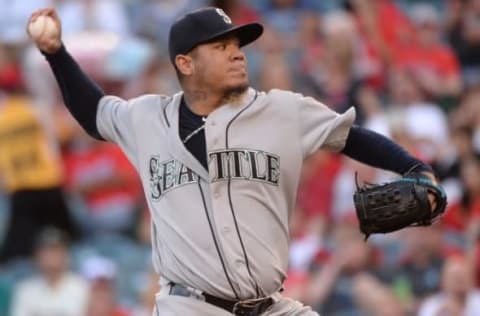 Apr 23, 2016; Anaheim, CA, USA; Seattle Mariners starting pitcher Felix Hernandez (34) throws in the 1st inning against the Los Angeles Angels at Angel Stadium of Anaheim. Mandatory Credit: Robert Hanashiro-USA TODAY Sports