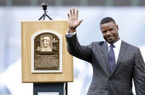 Aug 6, 2016; Seattle, WA, USA; Seattle Mariners former player Ken Griffey Jr. smiles next to his Hall of Fame plaques during his number retirement ceremony before the start of a game against the Los Angeles Angels at Safeco Field. Mandatory Credit: Jennifer Buchanan-USA TODAY Sports