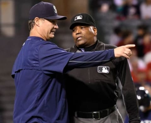 Sep 12, 2016; Anaheim, CA, USA; Seattle Mariners manager Scott Servais (9) argues with home plate umpire Laz Diaz (63) during the 6th inning at Angel Stadium of Anaheim. Service was disputing a ground rule double call. Mandatory Credit: Robert Hanashiro-USA TODAY Sports