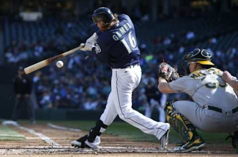 Oct 2, 2016; Seattle, WA, USA; Seattle Mariners left fielder Ben Gamel (16) breaks his bat against the Oakland Athletics during the fourth inning at Safeco Field. Mandatory Credit: Jennifer Buchanan-USA TODAY Sports