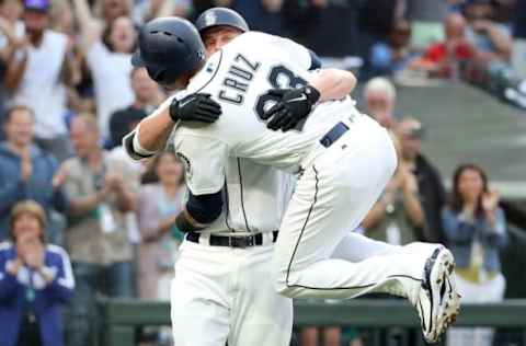 SEATTLE, WA – AUGUST 18: (EDITORS NOTE: Alternative crop) Kyle Seager #15 celebrates with Nelson Cruz #23 of the Seattle Mariners after hitting a three run home run against the Los Angeles Dodgers in the first inning during their game at Safeco Field on August 18, 2018 in Seattle, Washington. (Photo by Abbie Parr/Getty Images)