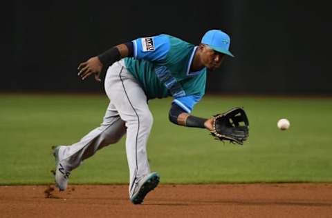 PHOENIX, AZ – AUGUST 24: Jean Segura #2 of the Seattle Mariners makes a play on a ground ball during the first inning against the Arizona Diamondbacks at Chase Field on August 24, 2018 in Phoenix, Arizona. The players are wearing special jerseys as part of MLB Players Weekend. (Photo by Norm Hall/Getty Images)