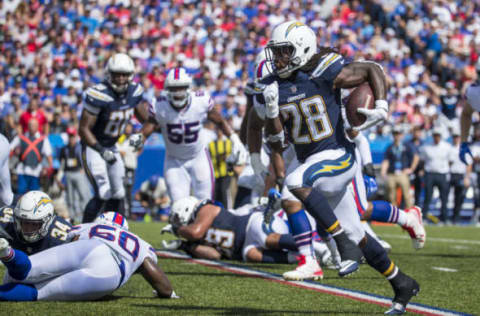 ORCHARD PARK, NY – SEPTEMBER 16: Melvin Gordon #28 of the Los Angeles Chargers carries the ball for a touchdown during the first quarter against the Buffalo Bills at New Era Field on September 16, 2018 in Orchard Park, New York. (Photo by Brett Carlsen/Getty Images)