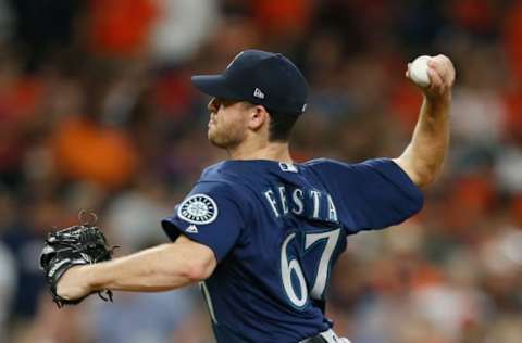 HOUSTON, TX – SEPTEMBER 19: Matt Festa #67 of the Seattle Mariners pitches in the first inning against the Houston Astros at Minute Maid Park on September 19, 2018 in Houston, Texas. (Photo by Bob Levey/Getty Images)