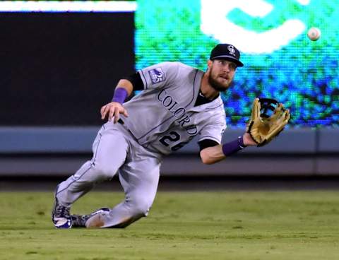 LOS ANGELES, CA – SEPTEMBER 19: David Dahl of the Colorado Rockies makes a catch for an out. (Photo by Harry How/Getty Images)