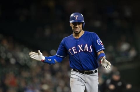 SEATTLE, WA – SEPTEMBER 28: Robinson Chirinos #61 of the Texas Rangers claps his hands as he runs home after hitting a two-run home run off of Wade LeBlanc #49 of the Seattle Mariners in the fourth inning at Safeco Field on September 28, 2018, in Seattle, Washington. (Photo by Lindsey Wasson/Getty Images)