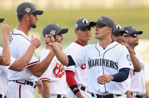 SURPRISE, AZ – NOVEMBER 03: AFL West All-Star, Evan White #15 of the Seattle Mariners is introduced to the Arizona Fall League All-Star Game at Surprise Stadium on November 3, 2018, in Surprise, Arizona. (Photo by Christian Petersen/Getty Images)