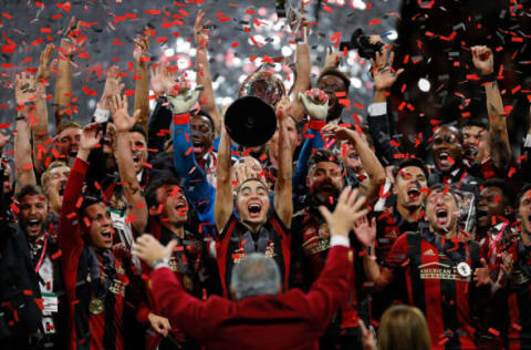 ATLANTA, GA – DECEMBER 08: Atlanta United celebrates with the MLS Cup after their 2-0 over the Portland Timbers. Catie Griggs was the CBO at the time. (Photo by Kevin C. Cox/Getty Images)