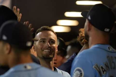 PEORIA, ARIZONA – MARCH 06: Braden Bishop #5 of the Seattle Mariners is congratulated by teammates after hitting a three-run home run against the Oakland Athletics during the spring training game at Peoria Stadium on March 06, 2019 in Peoria, Arizona. (Photo by Jennifer Stewart/Getty Images)