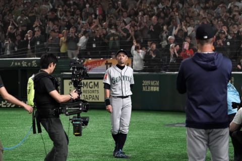 Ichiro shows his emotion as he is substituted to retire from baseball during the game between Seattle Mariners and Athletics at the Tokyo Dome. (Photo by Masterpress/Getty Images)