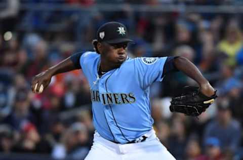 PEORIA, ARIZONA – MARCH 21: Justin Dunn #62 of the Seattle Mariners delivers a first-inning pitch during a spring training game against the Cincinnati Reds at Peoria Stadium on March 21, 2019, in Peoria, Arizona. (Photo by Norm Hall/Getty Images)