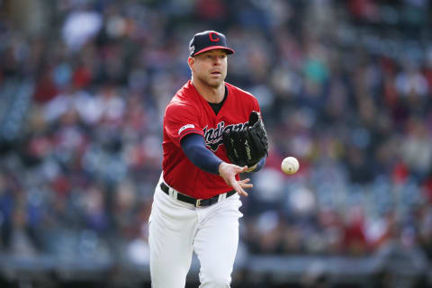 CLEVELAND, OH – APRIL 20: Corey Kluber of the Cleveland Indians throws to first base against the Braves. Kluber is a potential Mariners target. (Photo by Ron Schwane/Getty Images)