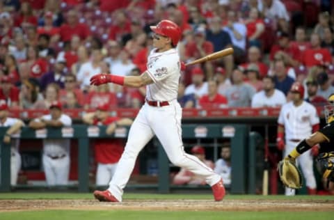 CINCINNATI, OHIO – MAY 28: Derek Dietrich #22 of the Cincinnati Reds hits a two-run home run in the 7th inning against the Pittsburgh Pirates at Great American Ball Park on May 28, 2019, in Cincinnati, Ohio. (Photo by Andy Lyons/Getty Images)